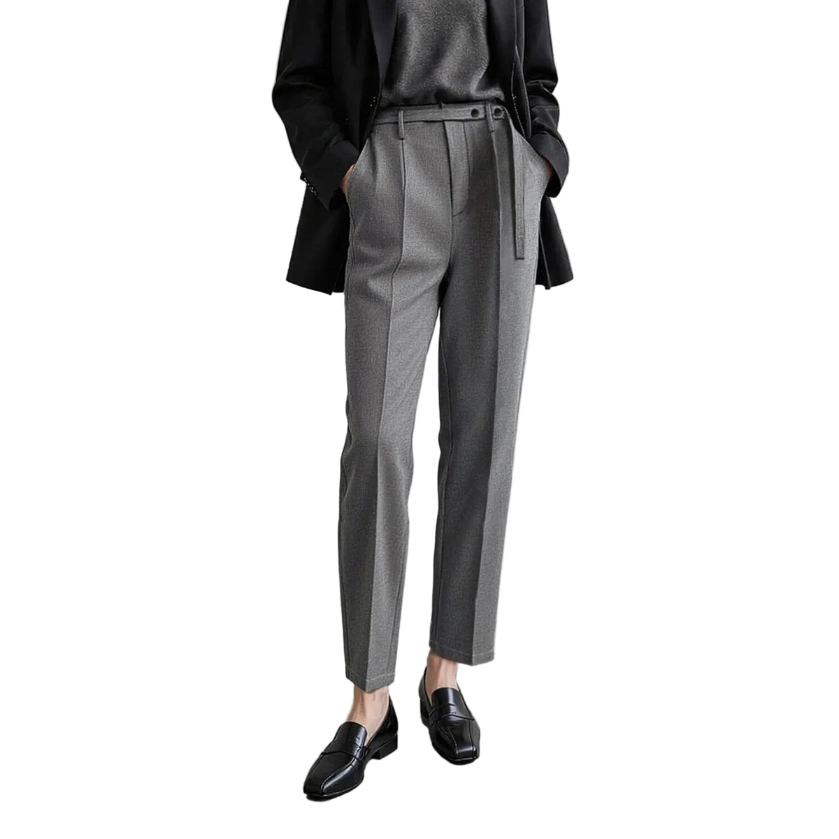 A model wearing a pair of AMII grey textured slim-fit trousers with a matching grey belt, styled with a black blazer, grey top, and black loafers against a minimalist studio background.