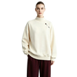 A model wearing an AMII cream-colored mock-neck sweatshirt with a small embroidered logo on the left chest, paired with dark burgundy pants, set against a light gray studio background.